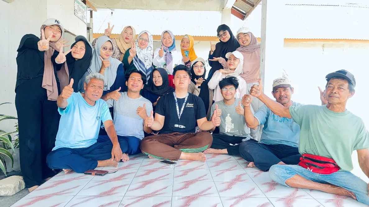 A group of people sitting on the ground AI-generated content may be incorrect.