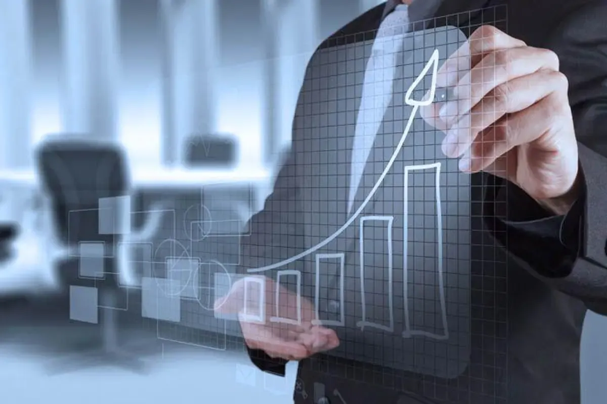 A person drawing a graph on a transparent screen AI-generated content may be incorrect.